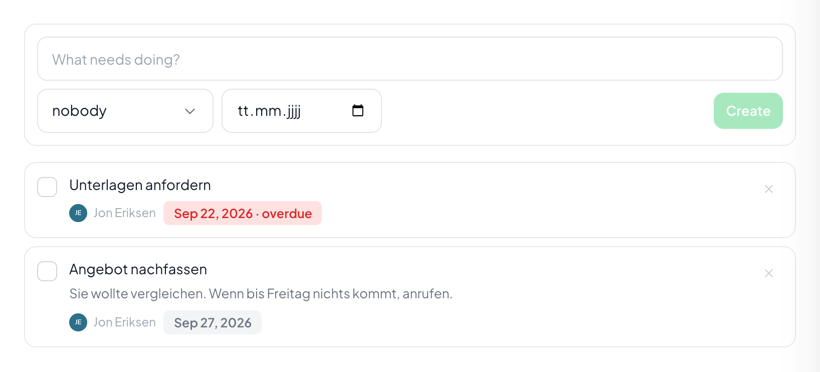 The upper task is past its deadline and shows in red. The lower one still has time and carries the same date in grey.